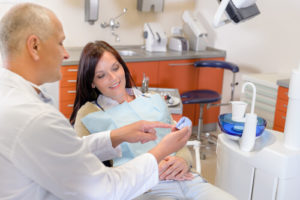 регулярное посещение стоматолога после имплантации